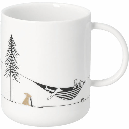 White mug with black and white illustration of a person in a hammock, a dog, and a tree on a white background