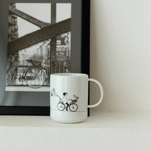 Hobby Porcelain Mug with Bicycle Graphic Lifestyle Image
