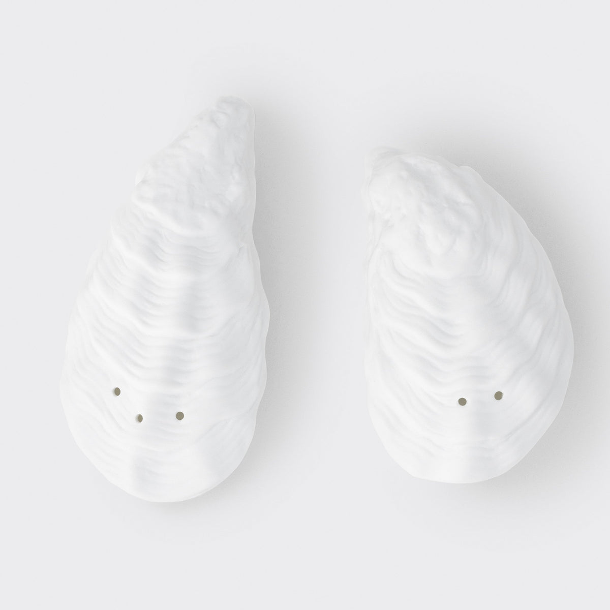 Porcelain Coastal Oyster Salt and Pepper Shaker Set on white background