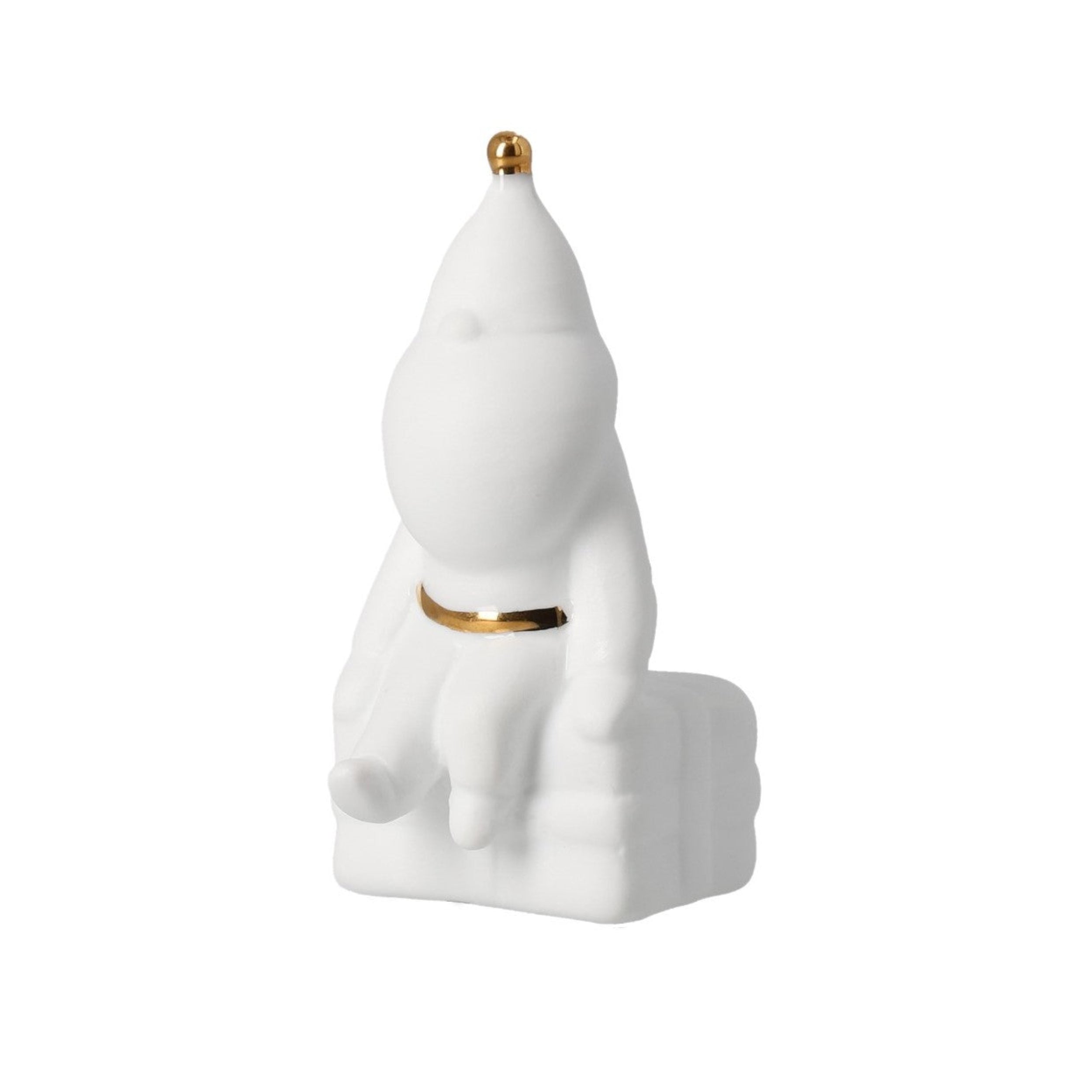 Santa sitting on top of a gift.