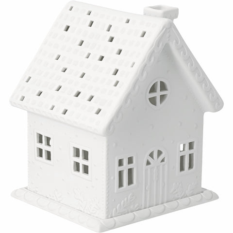 R92950 Village House Winter Cottage Porcelain Tealight House with Christmas Vines decor on a white background.