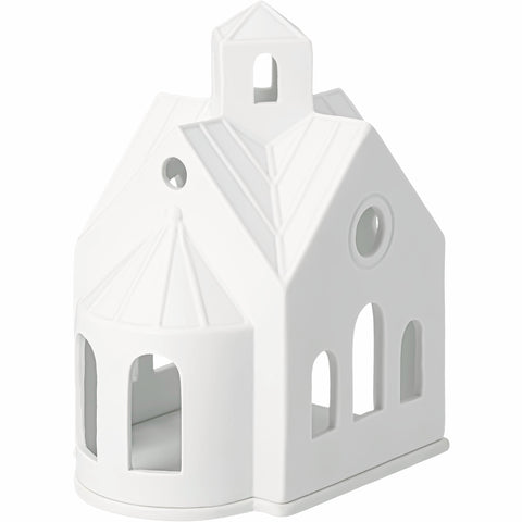 White chapel shaped candle holder on a white background