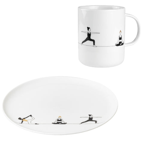 porcelain mug and plate set with black and white illustrations of people in various poses on a white background.